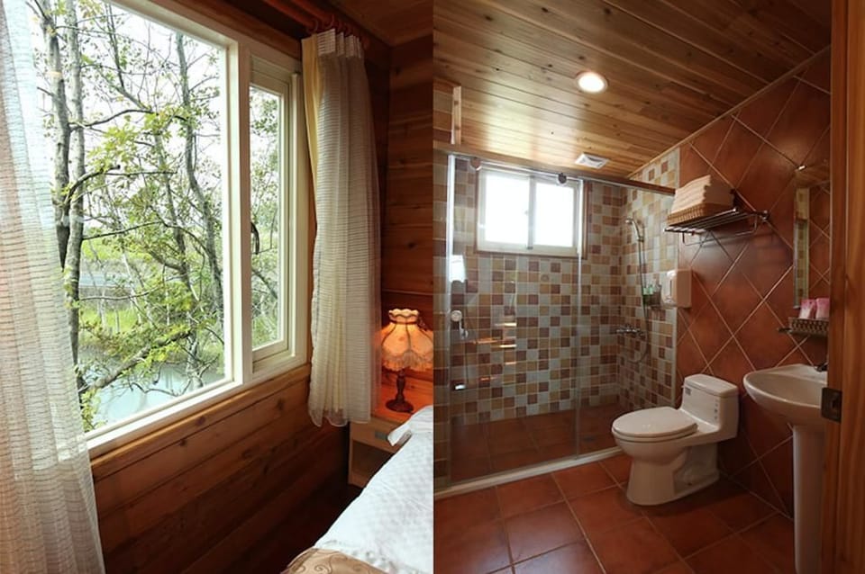 Log Cabin Quadruple Room (202) | Bathroom | Shower, free toiletries, slippers, towels