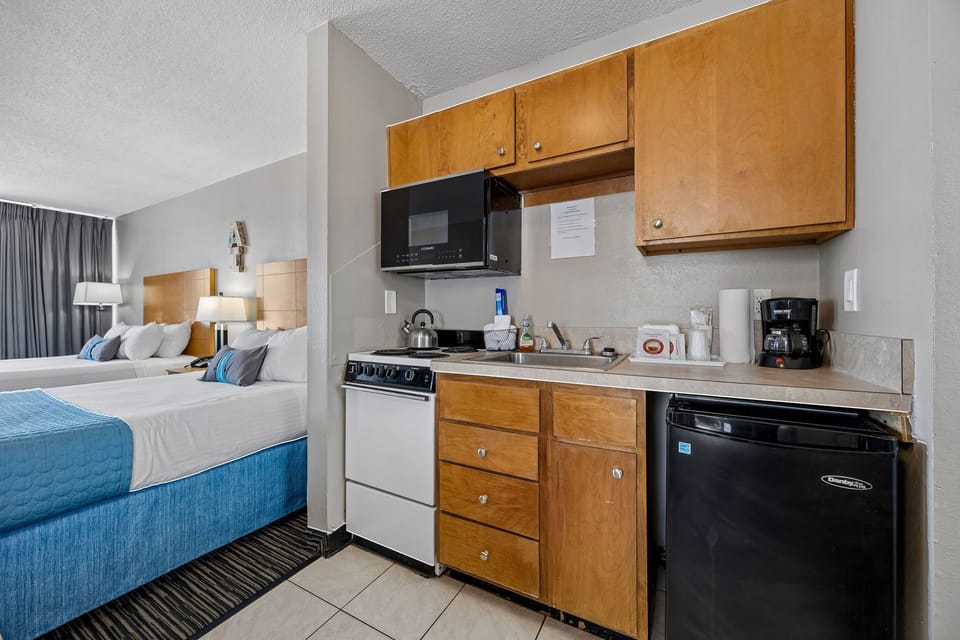 Suite, 2 Queen Beds, Kitchen, Oceanfront | Private kitchen | Coffee/tea maker