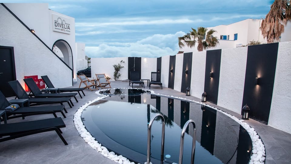 Outdoor pool, open 10:00 AM to 8:00 PM, pool umbrellas, sun loungers