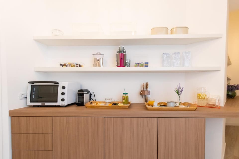 Deluxe Room, 1 Double Bed with Sofa bed, Non Smoking, City View | Shared kitchen | Fridge, microwave