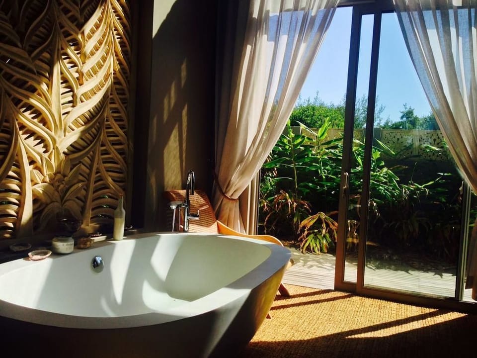 Shower, bathrobes, slippers, towels