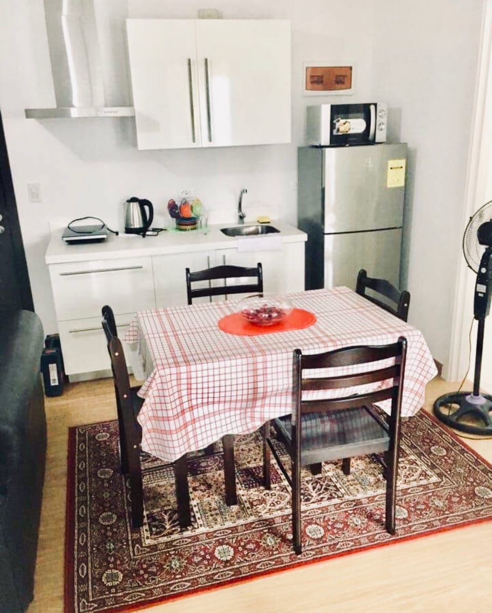 Fridge, microwave, stovetop, cookware/dishes/utensils