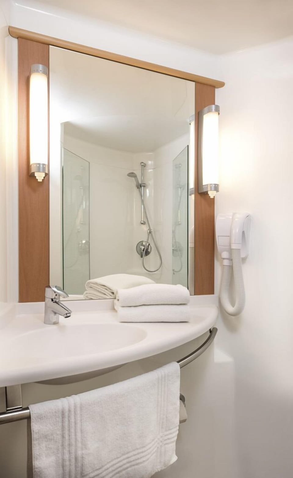 Eco-friendly toiletries, hair dryer, towels