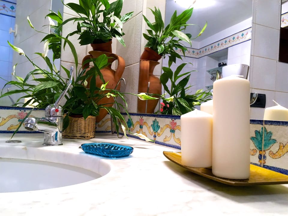 Comfort Quadruple Room, 2 Bedrooms, Connecting Rooms | Bathroom | Shower, free toiletries, hair dryer, slippers