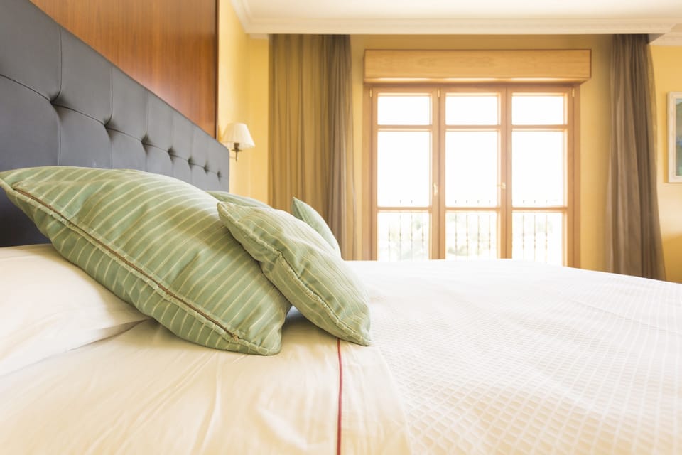 Superior Double Room | Minibar, desk, blackout drapes, iron/ironing board