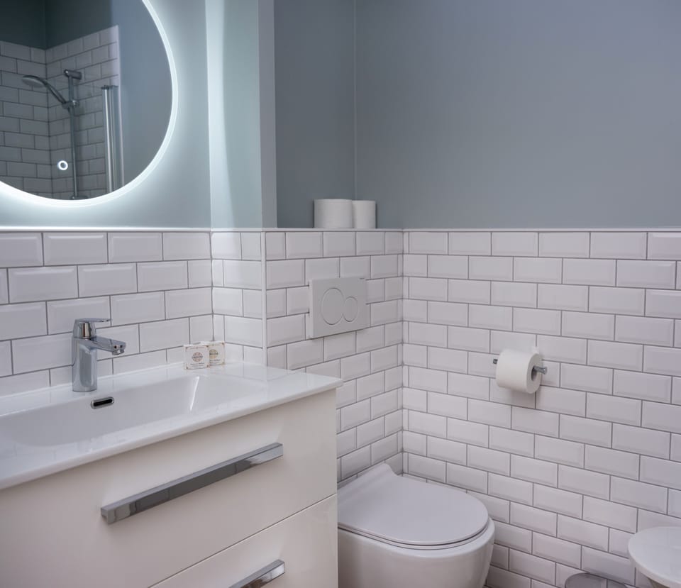 Comfort Quadruple Room, Sea View | Bathroom | Hair dryer, towels