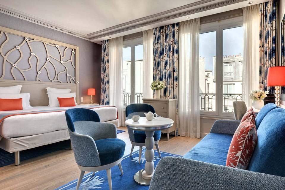 Deluxe Room | Premium bedding, in-room safe, desk, blackout drapes