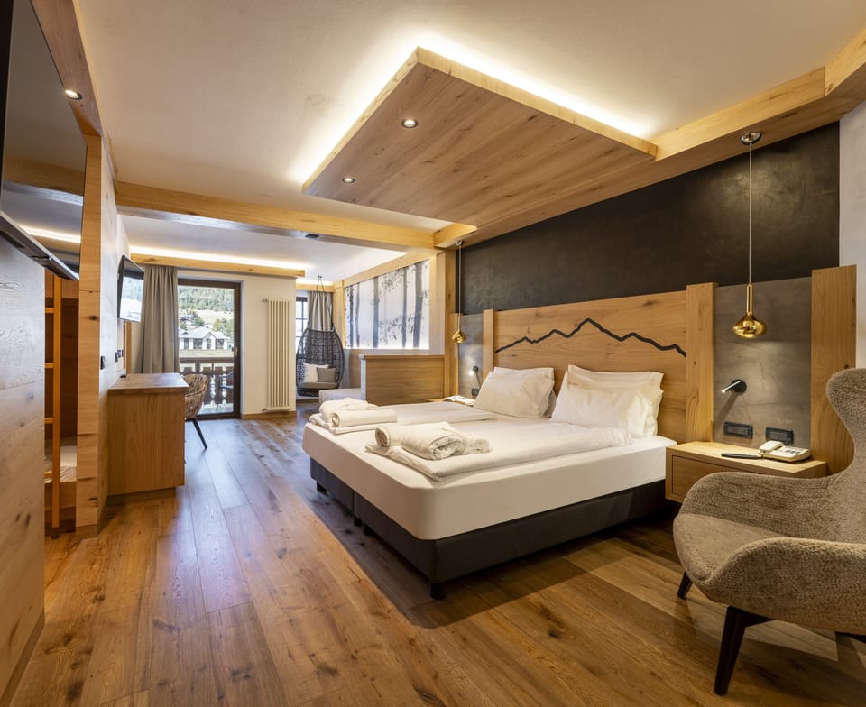 Triple Room | Frette Italian sheets, down comforters, Select Comfort beds, minibar