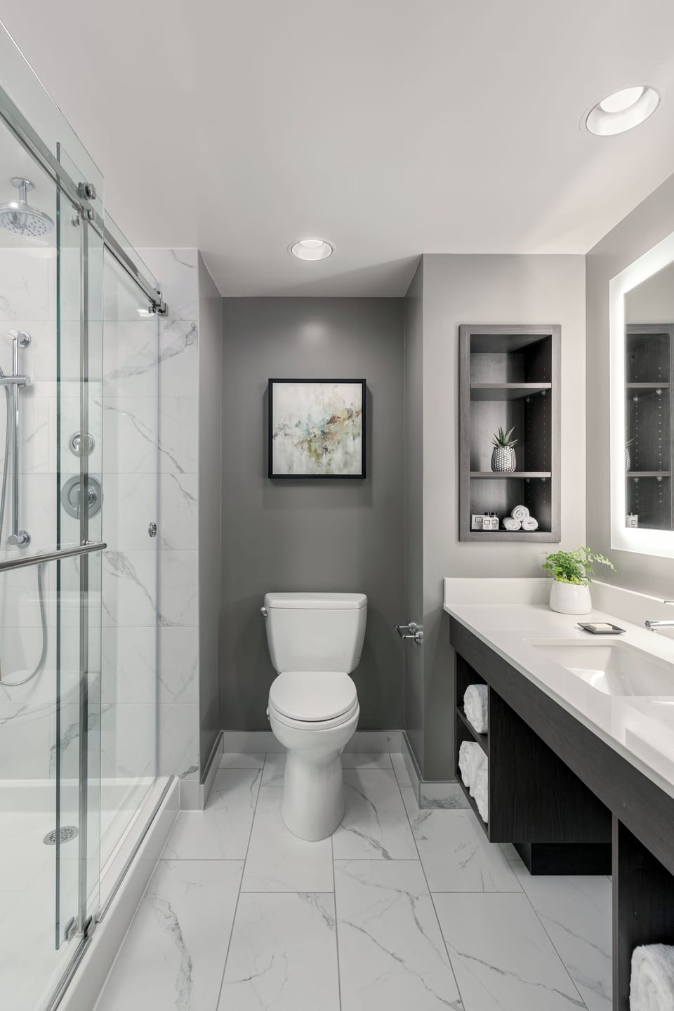 Shower, designer toiletries, hair dryer, bathrobes