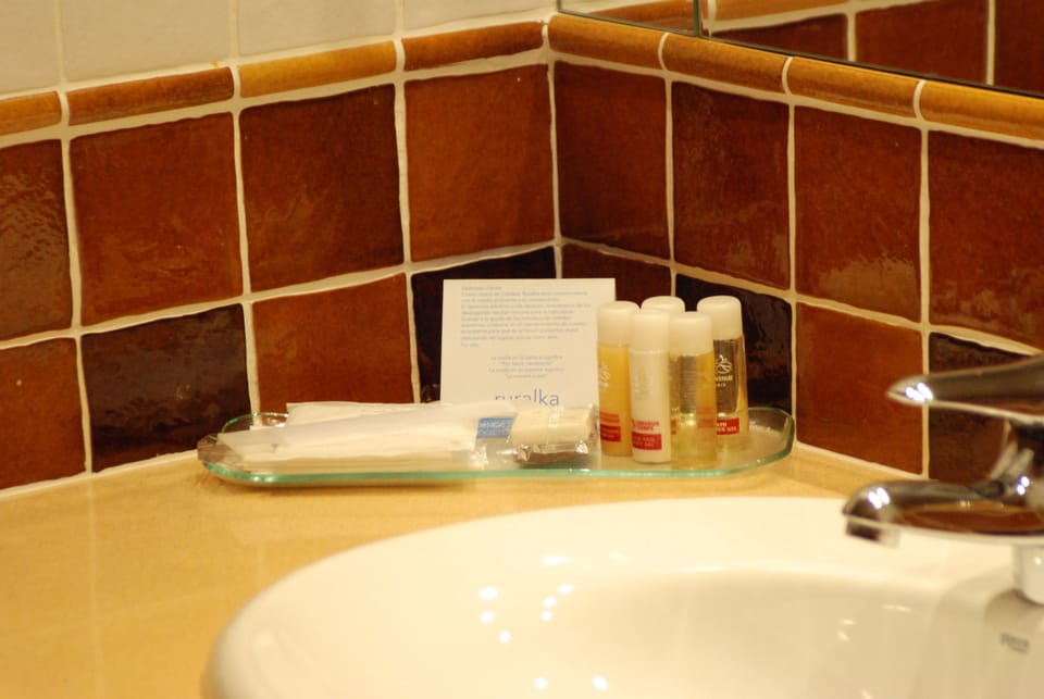 Junior Double Suite | Bathroom amenities | Hair dryer, towels