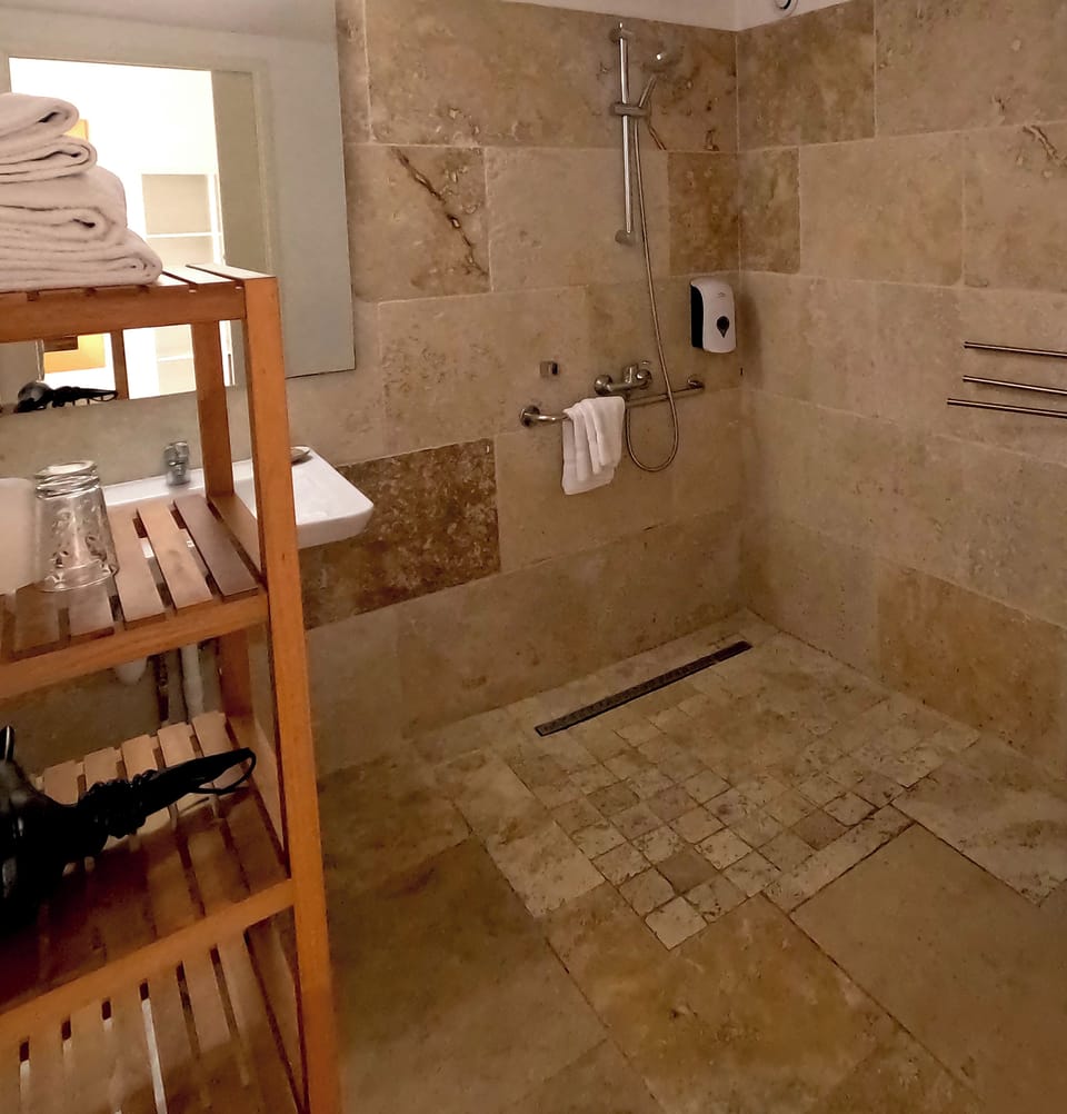 Superior Double Room, Sea View | Bathroom | Shower, hair dryer, towels