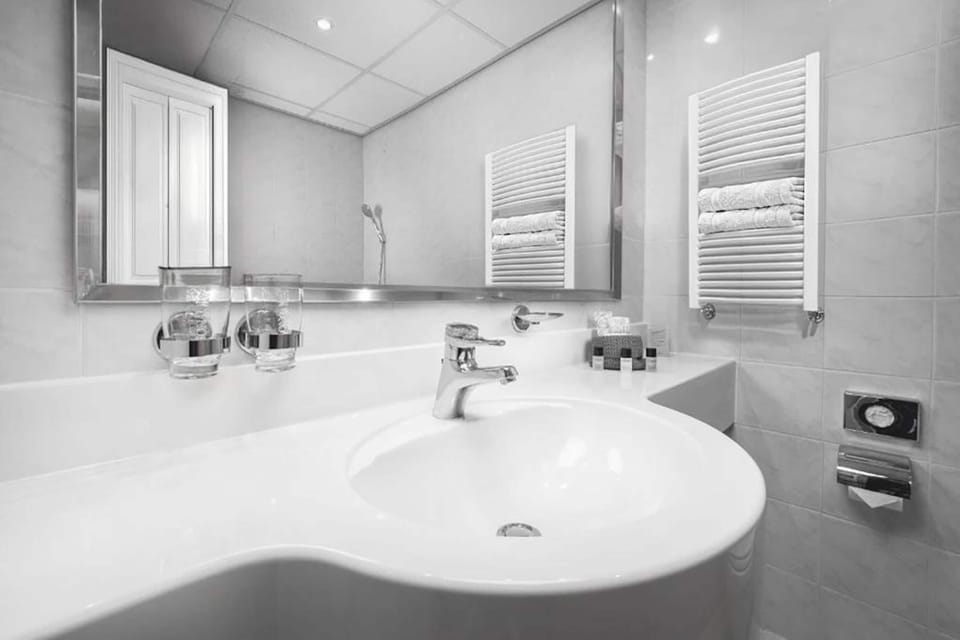 Hair dryer, slippers, towels, soap