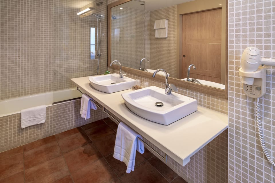 Hair dryer, towels, soap, shampoo