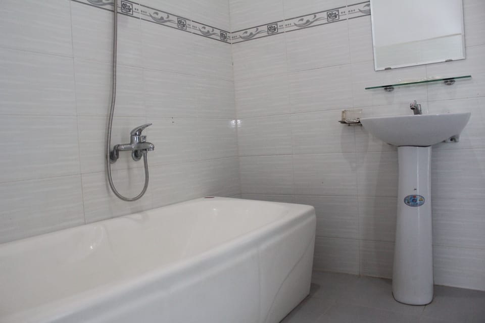 Shower, free toiletries, hair dryer, slippers