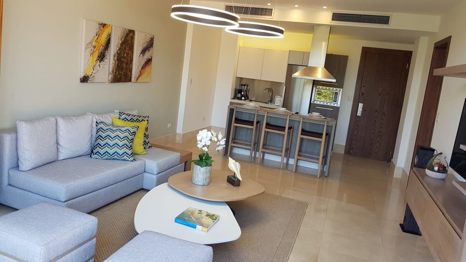 Condo, 1 Bedroom (All Inclusive) | Living area | Flat-screen TV
