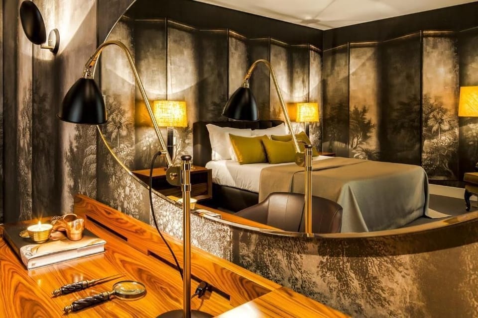Suite Master Deluxe | Minibar, in-room safe, desk, laptop workspace