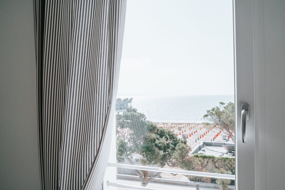 Quadruple Room, Sea View | Balcony