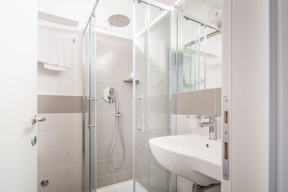 Quadruple Room, Sea View | Bathroom | Shower, free toiletries