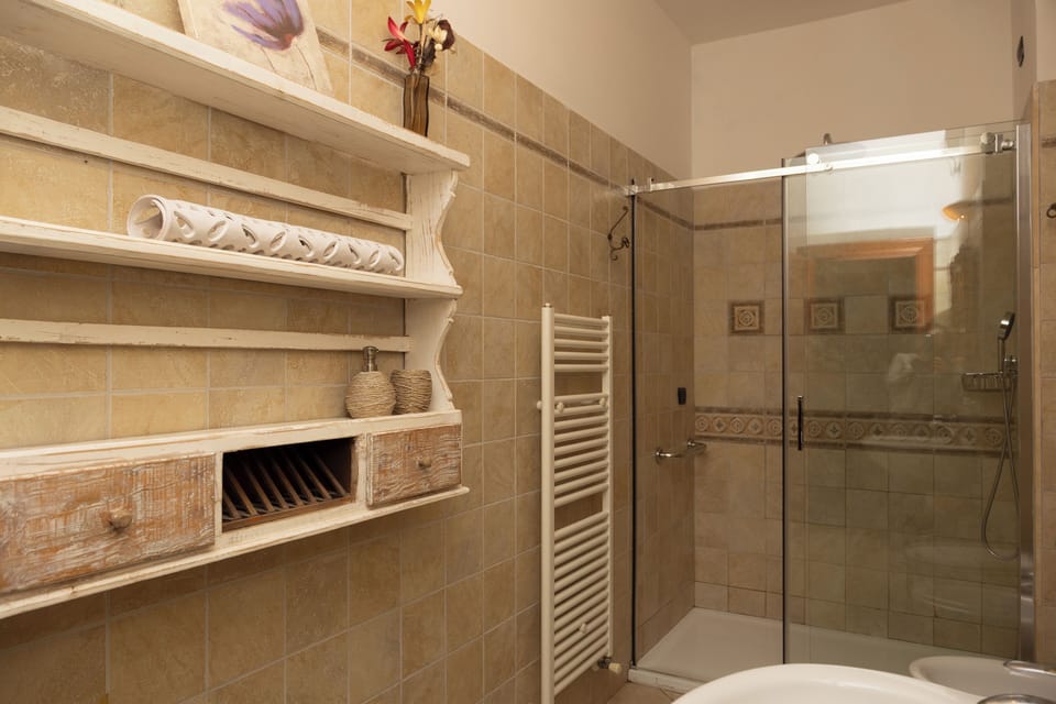 Luxury Quadruple Room | Bathroom | Hair dryer, bidet, towels, soap
