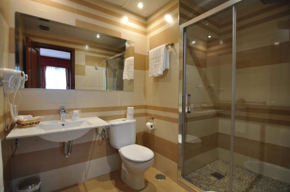 Free toiletries, hair dryer, bidet, towels