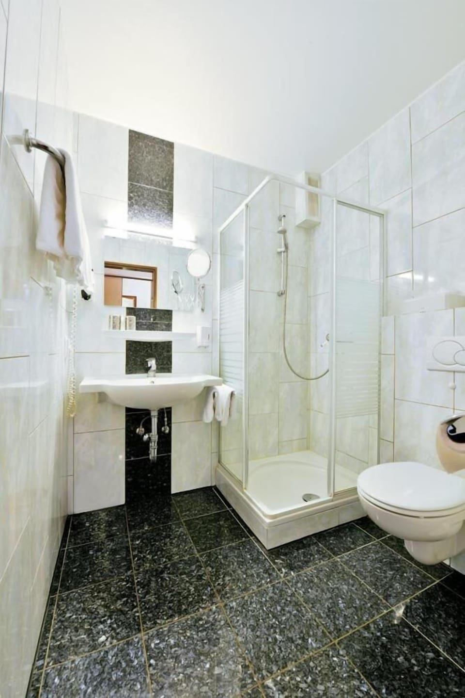 Shower, free toiletries, hair dryer, towels