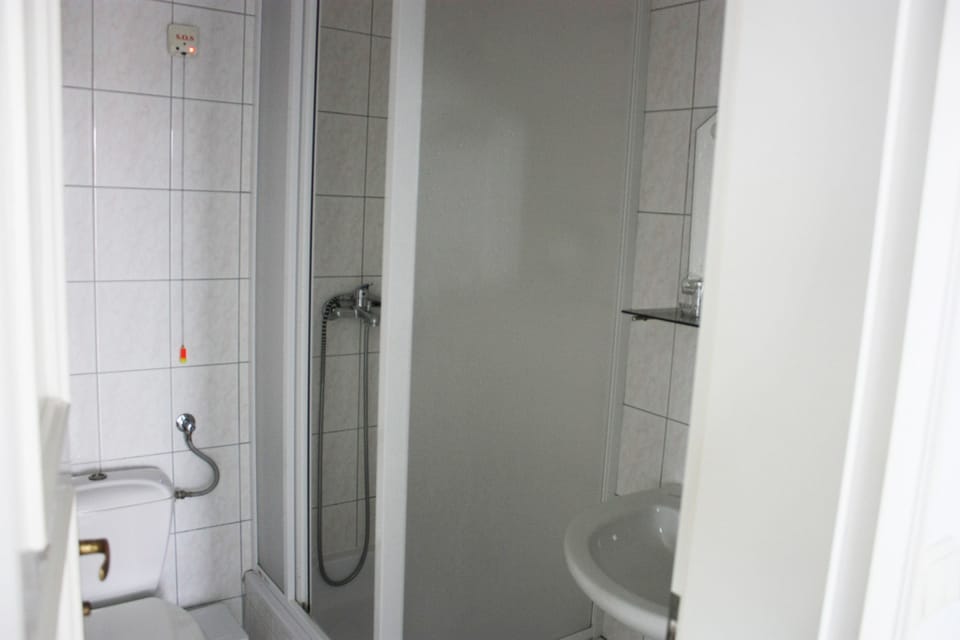 Shower, free toiletries, towels, soap