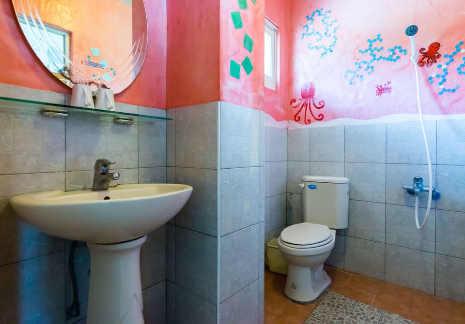Double Room, Balcony, Ocean View | Bathroom | Shower, rainfall showerhead, hair dryer, slippers