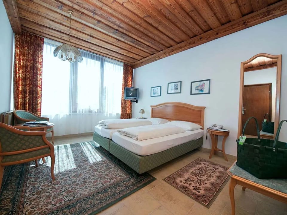 Standard Apartment | Minibar, in-room safe, WiFi (free), individually decorated