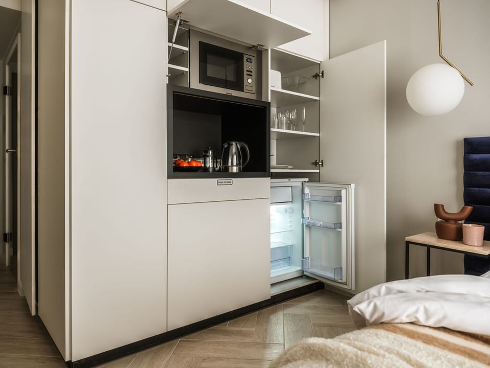 Classic Double Room, 1 Queen Bed, Refrigerator | Private kitchenette | Fridge, microwave, electric kettle, toaster