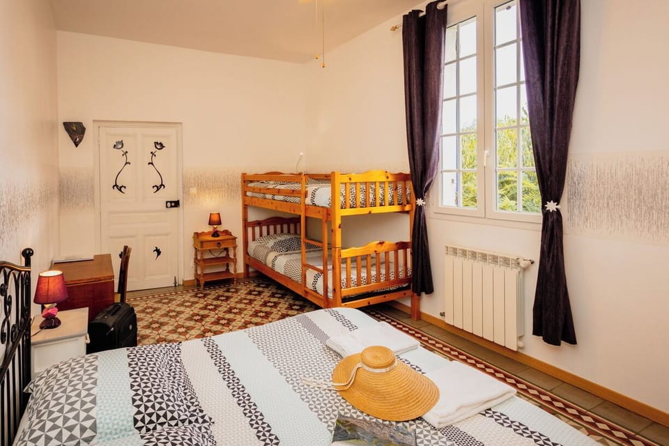 Quadruple Room | Pillowtop beds, iron/ironing board, free cribs/infant beds, WiFi