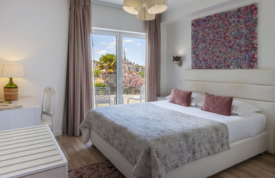 Double Room, Balcony (Monastery View) | Minibar, individually decorated, desk, laptop workspace