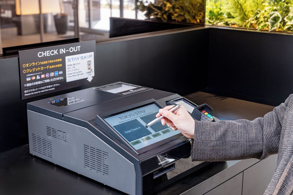 Check-in/check-out kiosk