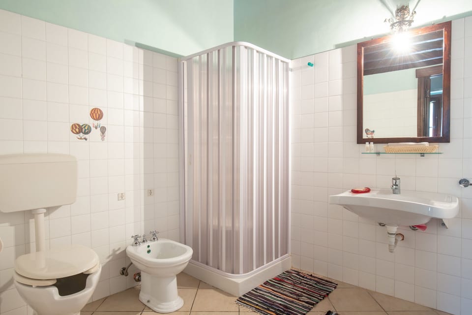 Family Apartment, 1 Bedroom, Courtyard View | Bathroom | Shower, free toiletries, hair dryer, bidet