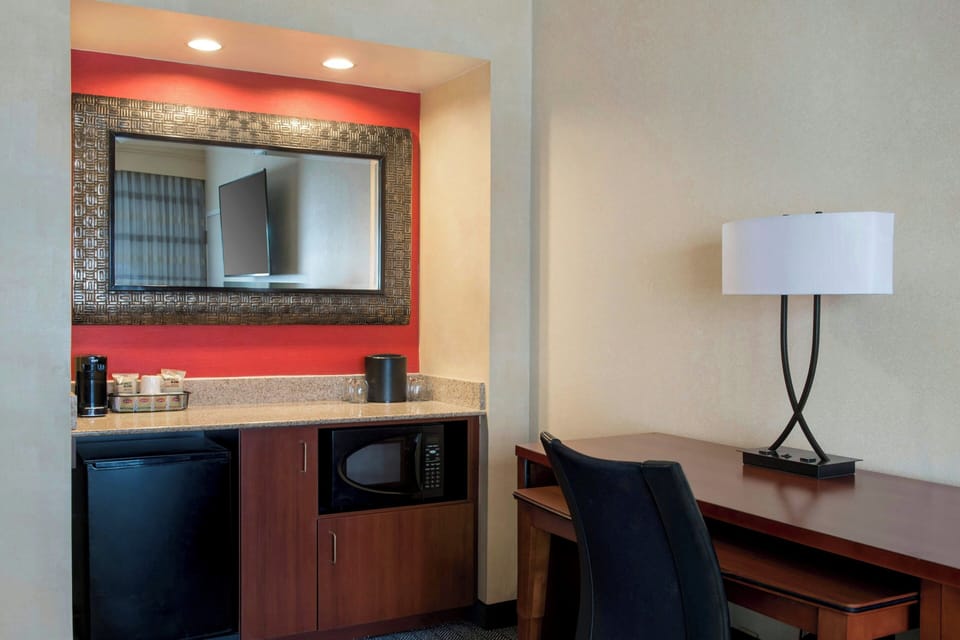 Premium bedding, in-room safe, desk, iron/ironing board