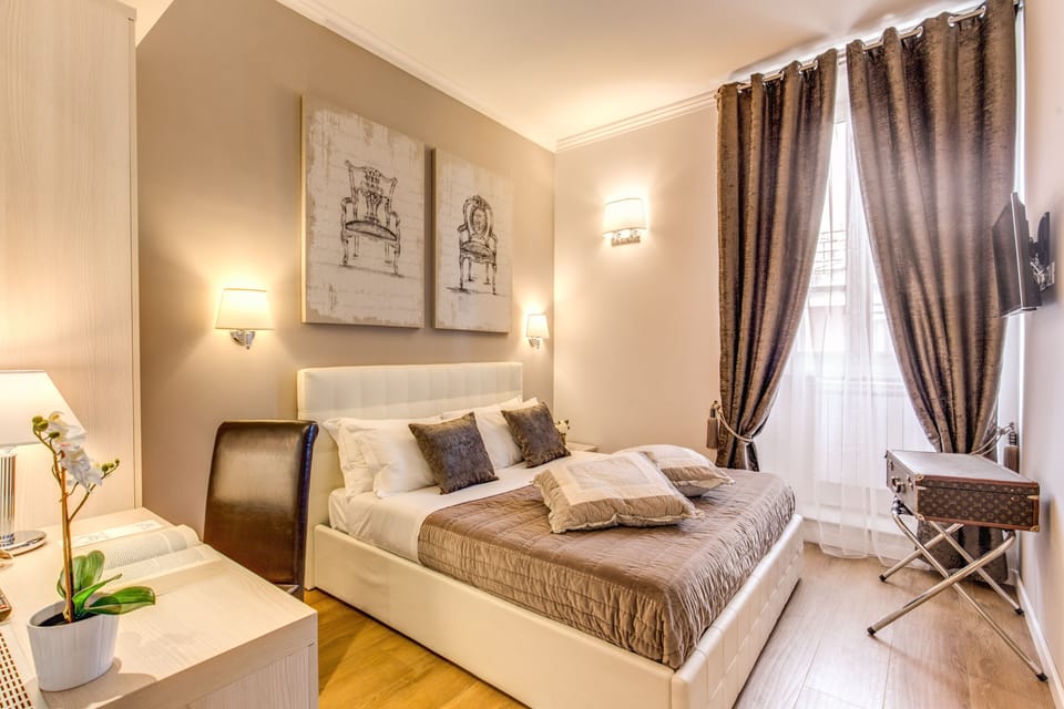 Premium bedding, down comforters, memory foam beds, minibar