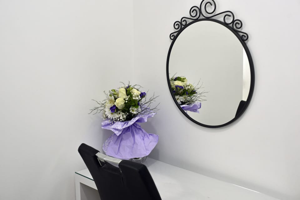 Deluxe Studio | Desk, laptop workspace, blackout drapes, iron/ironing board