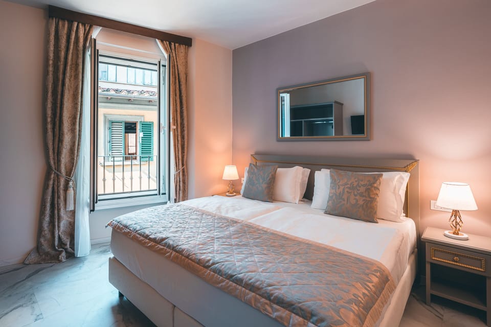 Double Room | Minibar, in-room safe, desk, blackout drapes