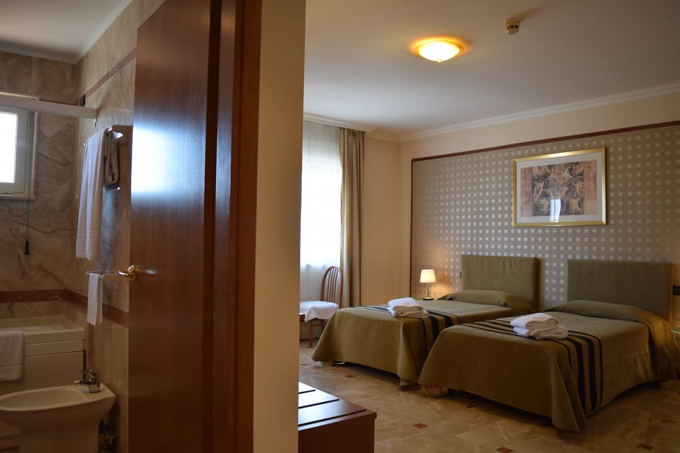 Select Comfort beds, minibar, in-room safe, desk