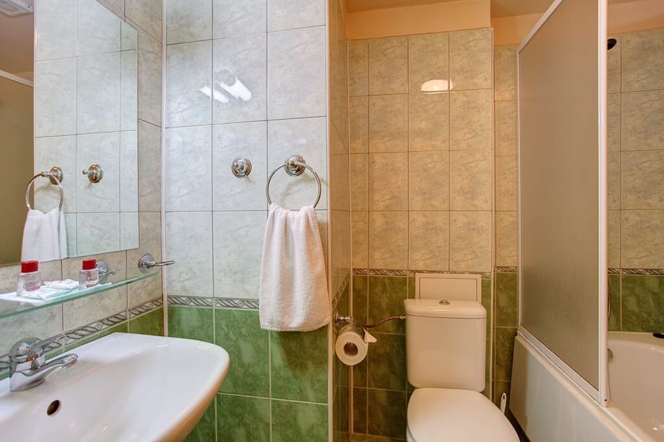 Hair dryer, slippers, towels