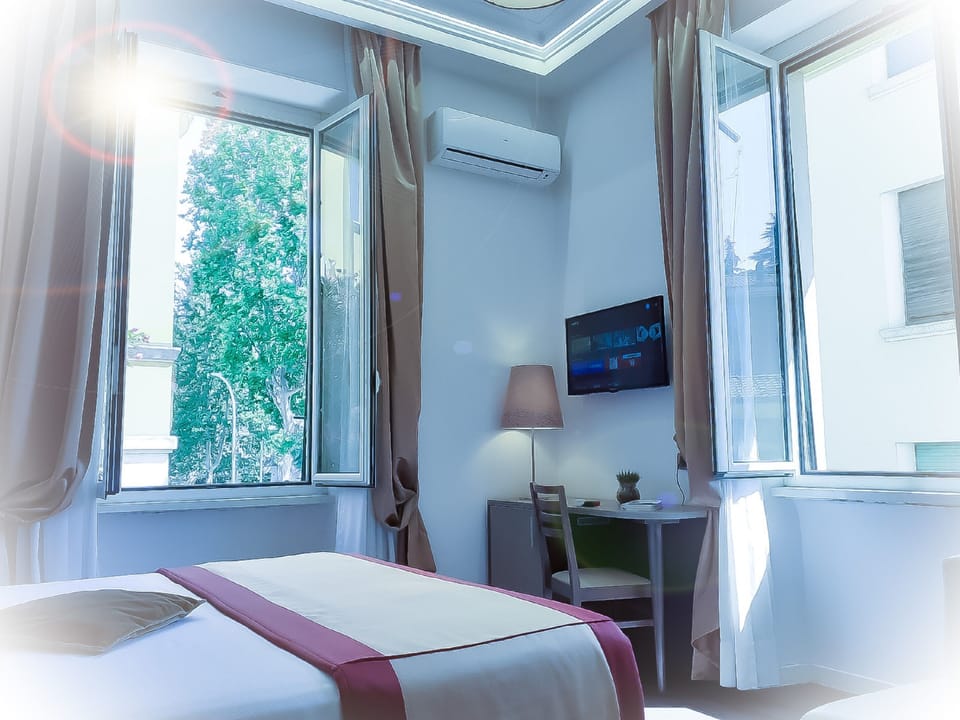 Double Room | Minibar, in-room safe, desk, laptop workspace
