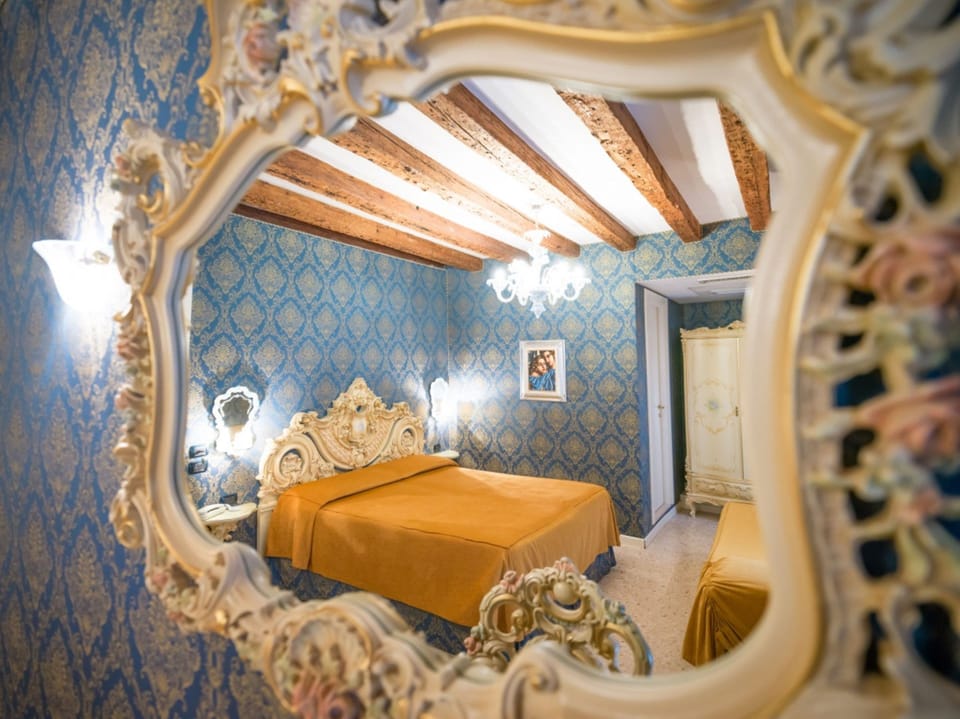 Triple Room | Down comforters, in-room safe, soundproofing, free WiFi