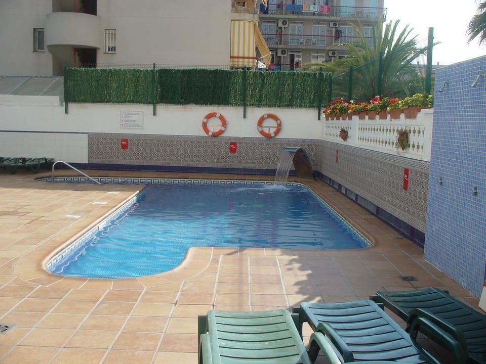 Seasonal outdoor pool, sun loungers