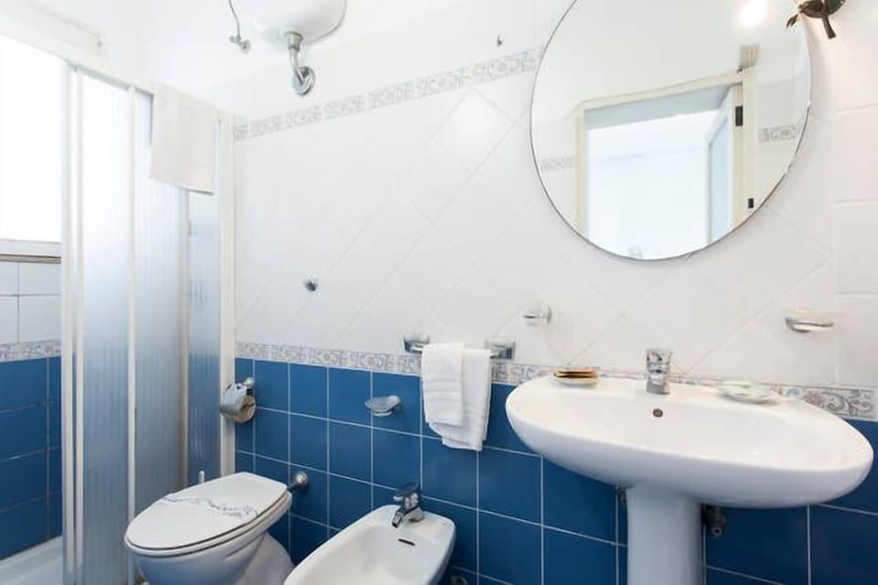 Quadruple Room, Sea View | Bathroom | Shower, free toiletries, hair dryer, bidet