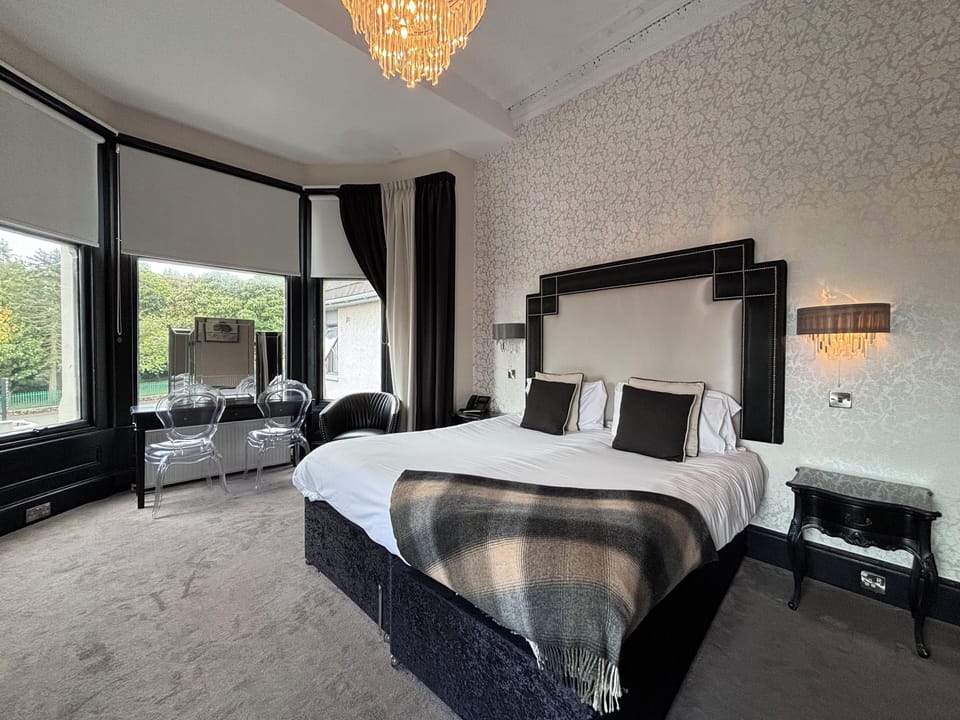 Deluxe Room | Desk, blackout drapes, iron/ironing board, free WiFi