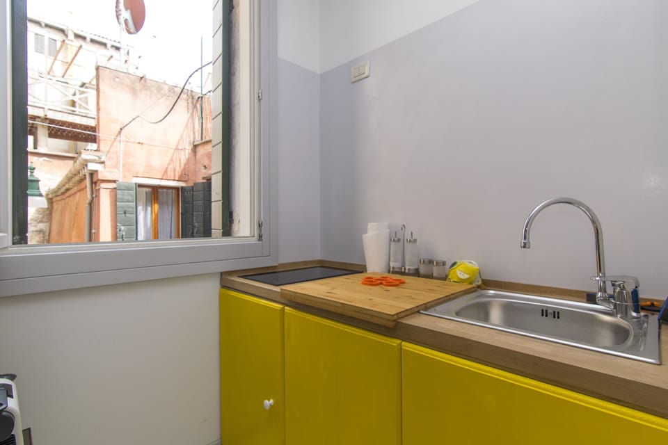 Apartment, 2 Bedrooms | Private kitchenette | Fridge, microwave, stovetop, dishwasher
