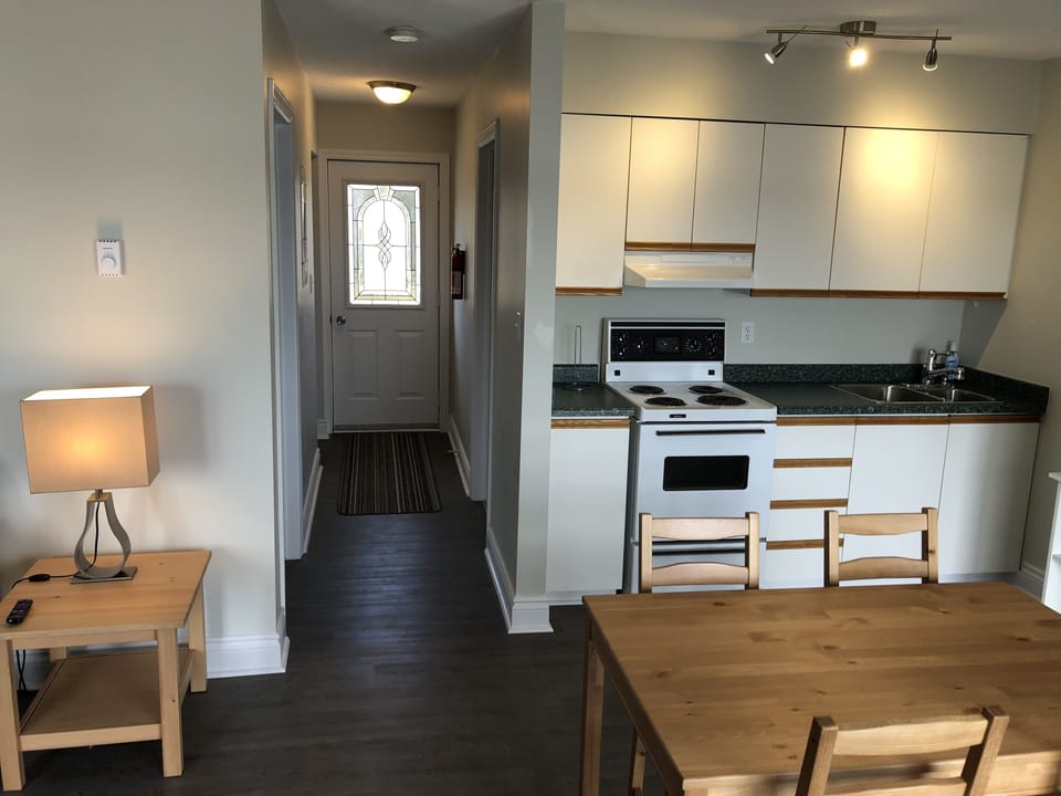 Signature Suite, Lake View | Living area | Flat-screen TV