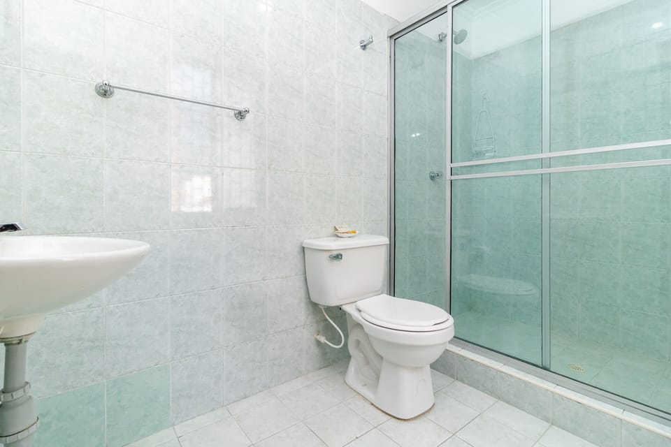 Standard Quadruple Room | Bathroom | Shower, designer toiletries, towels, soap
