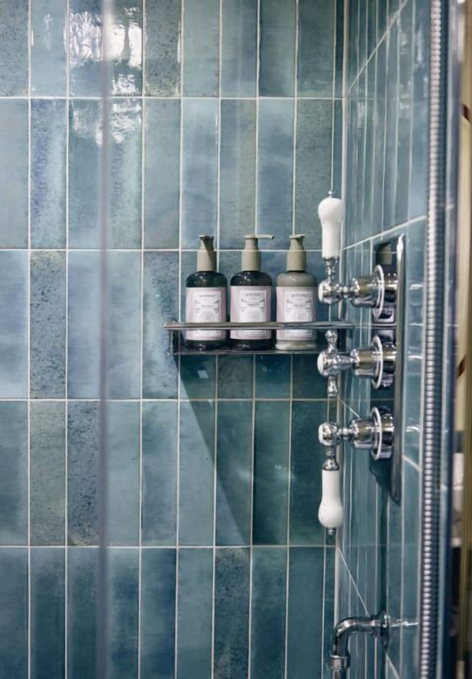 Cottage King Room | Bathroom | Hair dryer, towels, soap, shampoo