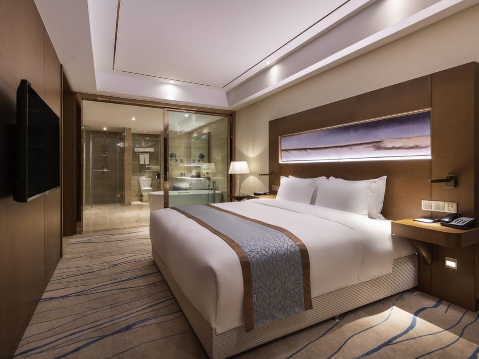 Deluxe Suite, 1 King Bed | In-room safe, desk, soundproofing, iron/ironing board (on request)