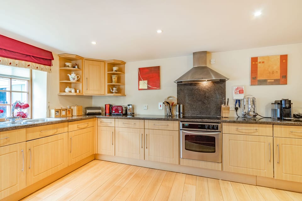 Cottage | Private kitchen | Stovetop, dishwasher, highchair, cookware/dishes/utensils